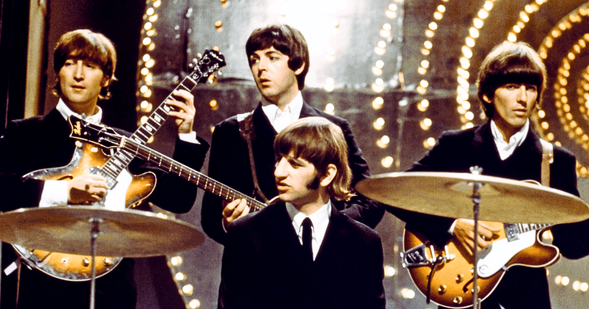 Foto histórica dos Beatles colorida.